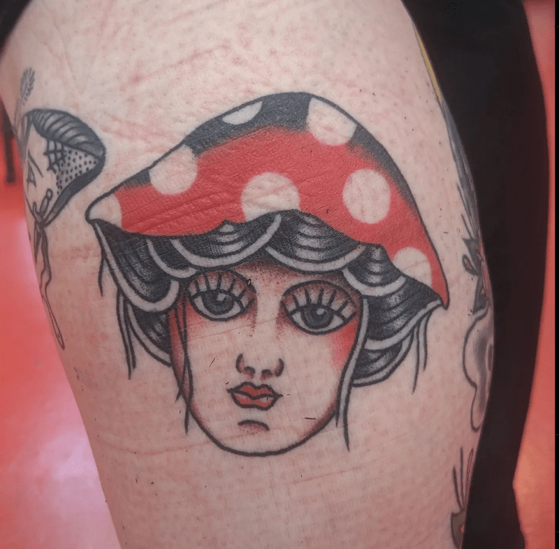 Lady with mushroom hat on Arm